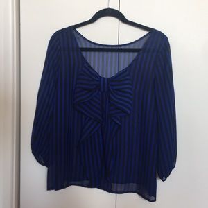 Adorable striped blouse with bow back detail!